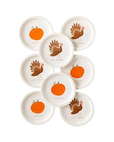 six thanksgiving plates with turkeys on them