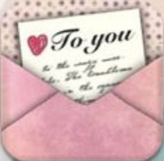 an open pink envelope with a piece of paper that says to you on the front