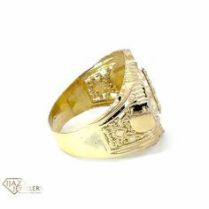 Introducing our stunning 10k gold ring with two-tone accents and an anchor center design adorned with beautiful cubic zirconia stones. Crafted with precision, this ring boasts of sophistication and grace, making it an ideal accessory for any occasion. Gold Filigree Promise Ring With Center Stone, Gold Signet Ring With Center Stone In 14k Gold, Gold Engraved Ring With Center Stone In 14k Gold, Gold Filigree Ring With Diamond Accents In 14k Gold, Gold 14k Signet Ring With Center Stone, 14k Gold Anchor Shaped Jewelry Gift, Luxury Yellow Gold Coat Of Arms Signet Ring, Luxury Anchor-shaped Jewelry Gift, Yellow Gold Nautical Anchor Jewelry