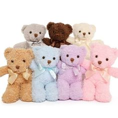 a group of teddy bears sitting next to each other