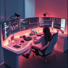 a woman sitting at a computer desk with multiple monitors