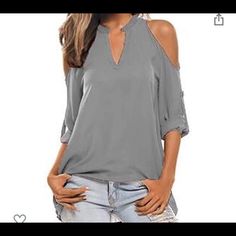 Brand New With Tags. Women’s Gray Cold Shoulder Blouse V Neck. Sleeve Have Button For Rolled Up Look .. Front Is Shorter Than The Back Summer V-neck Gray Blouse, Summer Gray V-neck Blouse, Trendy Gray Spring Blouse, Gray Blouse For Spring Day Out, Gray Spring Blouse For A Day Out, Spring Gray Blouse For Day Out, Casual Gray Blouse For Day Out, Chic Gray Summer Blouse, Elegant Gray Summer Blouse