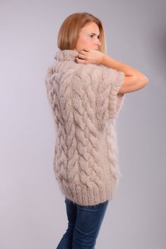 Soft cable knit mohair sweater with short sleeves, Shawl collar. This is an excellent choice for a gift for your loved ones or for yourself. Wear it with jeans, tights, skirts, trousers. Suitable for any occasion. We can knit it for you in any color, size and length you desire. create your personal style with us. Materials : longhair mohair. All the measurements are taken with the item flat and not stretched Please check carefully the described measurements before you decide to purchase this ite Knitted Short Sleeve Sweater For Winter, Beige Knitted Short Sleeve Sweater, Winter Knit Sweater With Short Sleeves, Winter Cable Knit Short Sleeve Sweater, Mohair Jumpers, Sweater Shawl, Chunky Turtleneck Sweater, Cable Knit Vest, Collar Vest