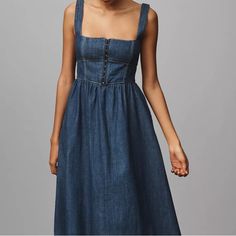 [ Nwt ] Size 6 Reformation Tagliatelle Denim Midi Dress Blue [ The Price Is Firm Because It Was Purchased At Full Price With Tax And Please Consider Posh 20% Fees, I Missed My Return Date] More Details A Different Sort Of Tagliatelle. With A Fitted, Corset-Style Bodice And Full Midi Skirt, The Reformation Tagliatelle Denim Midi Dress Is A Perfect Spring Style That Can Be Dressed Up Or Down With The Swap Of A Few Accessories. Responsibly Made With Regenerative Cotton 57% Regenerative Cotton, 43% Blue Denim A-line Dress, Summer Indigo Dresses With Buttons, Blue Denim Midi Dress With Buttons, Blue Denim Buttoned Midi Dress, A-line Denim Blue Denim Dresses, Denim Blue A-line Denim Dress, Blue A-line Denim Dress, Chic Washed Blue Midi Dress, Fitted Indigo Midi Dress For Summer