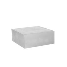 a white square box sitting on top of a white flooring tile covered in cement