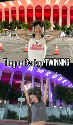 two women in front of a building with the caption they can't stop twining