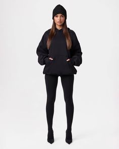 The comfort of sweats with a streetwear sensibility. Engineered with a double lined self fabric to keep you extra warm our black hue oversized sweater features a hoodie, kangaroo pockets, long sleeves, and a relaxed fit that transforms the at-home must-have into an any time, anywhere essential. Loungewear Collection Import 100% Cotton Model wears size XS Oversized fit Black Fleece Hoodie With Pockets, Cozy Black Hoodie With Pockets, Black Relaxed Fit Cozy Hoodie, Oversized Athleisure Hoodie With Ribbed Cuffs, Oversized Athleisure Sweats With Adjustable Hood, Black Cozy Sweatshirt With Pockets, Cozy Black Sweatshirt With Pockets, Black Athleisure Hoodie With Pockets, Black Sweats With Kangaroo Pocket For Fall