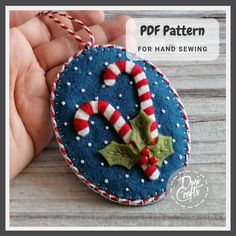 a handmade ornament with candy canes on it