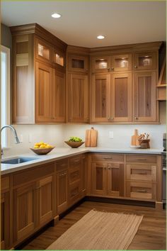 a kitchen with wooden cabinets and white counter tops