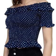 100% Polyester Woven Smocked Top Ruffle Off The Shoulder Neckline That Fall Into Short Sleeve Small Ruffle Flounce Layer Cropped Ruffle Hem Color: Navy Casual Off-shoulder Ruffle Tops, Casual Off-shoulder Blouse With Ruffles, Casual Off-shoulder Smocked Top For Summer, Short Sleeve Smocked Top With Ruffles For Vacation, Ruffled Smocked Short Sleeve Top For Vacation, Ruffled Smocked Top With Short Sleeves For Vacation, Summer Off-shoulder Blouse With Smocked Back, Trendy Blue Smocked Top, Trendy Blue Smocked Top For Day Out