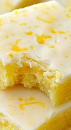 three pieces of yellow cake with white frosting