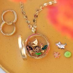 an assortment of jewelry sitting on top of a table