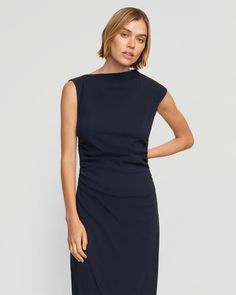 The elevated midi dress is a wardrobe must-have — Manon exudes effortless polish with its asymmetric neckline, ruched sides, and wrap front. We love to style it with a sleek pair of heeled boots for a desk-to-drinks look. See below for our general Size Guide and available measurements Made of 73% rayon, 23% nylon, and 4% spandex Machine wash cold and lay flat to dry Versatile Fitted Dress For Work, Versatile Fitted Workwear Dress, Midi Length Elastane Dress With Ruched Back, Draped Dresses With Flattering Silhouette, Versatile Midi-length Dress For Work, Fitted Ruched Midi Dress For Work, Chic Office Dresses With Ruched Detail, Elastane Midi Dress With Ruched Bodice, Midi Dress With Ruched Bodice In Elastane