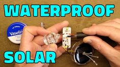 two hands are working on a waterproof solar panel