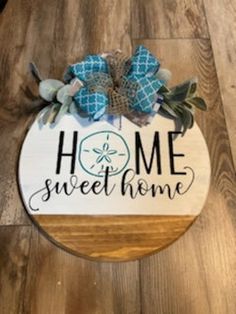 a wooden sign that says home sweet home