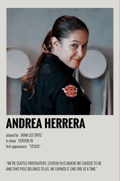 a woman in uniform is smiling and posing for the camera with her name on it