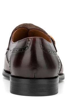 This texture-rich leather loafer boasts an ornate design with brogue detail and a kiltie vamp. The double-buckle monk straps provide a secure fit for added comfort. Double monk strap vamp Cushioned insole Leather upper and lining, rubber sole Imported Masculine Brown Wingtip Monk Strap Shoes, Brown Wingtip Monk Strap Shoes With Leather Lining, Brown Monk Strap Wingtip Shoes With Leather Lining, Brown Cap Toe Monk Strap Shoes For Derby, Brown Monk Strap Shoes With Brogue Detailing, Leather Wingtip Loafers With Buckle Closure, Vintage Leather Monk Strap Shoes For Formal Occasions, Vintage Brown Monk Strap Shoes With Brogue Detailing, Vintage Monk Strap Shoes With Brogue Detailing