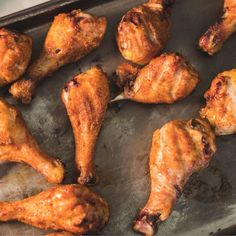 chicken wings on a baking sheet ready to be cooked in the oven for dinner time