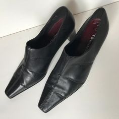 Vintage y2k shoes, brand - Tamaris. Black genuine leather pointy shoes for women. Casual shoes with mid heels. Brand: Tamaris Material: leather Color: black Size - EU 40  / UK 6.5 / US 8,5 - 9 Condition: These shoes are in great vintage condition (used 1-2 times) with only the insole is slightly damaged.    MEASUREMENTS (approximately): - Insole length (measured up to the tip of the shoes) - 10 3/4" (27,5 cm) - Sole Width (Width across the widest part of the outer sole) - 3 1/2" (9 см) - Heel height - 2 1/4" (6 cm) - Weight approx - 490 g  !! Vintage items may have some signs of wear. Please take this into consideration when purchasing !! If you have any questions please contact me. Thank you for visiting and have a great day! Pointed Toe Leather Shoes For Work, Pointed Toe Leather Shoes For Business, Black Square Toe Kitten Heels For Work, Pointed Leather Kitten Heels For Office, Black Pointed Toe Kitten Heels With Leather Sole, Black Kitten Heels With Pointed Toe And Leather Sole, Black Leather Kitten Heels For Business, Pointed Toe Leather Shoes, Fitted Leather Kitten Heels With Square Toe