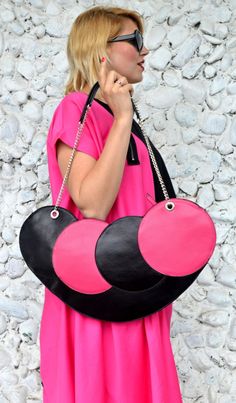 "Extravagant black and fuchsia tote that will brighten up your wardrobe and jazz up the streets! Fun, artsy and playful design made of genuine leather, soft and light, easy an definitely fun to wear! Genuine leather tote from the new and daring \"The French Kiss\" collection. Dimensions: length 50 cm ( 19,68 inches), height 25 cm ( 9,84 inches). Handle length 75 cm ( 29,52 inches) Material: 100% genuine leather" Black Bags With Detachable Handle For Fashion, Black Shoulder Bag With Removable Pouch For Fashion, Chanel Handbags Collection, Diy Clutch Bag, Diy Bags No Sew, Statement Purse, Ankara Bags, African Bag, Triangle Bag