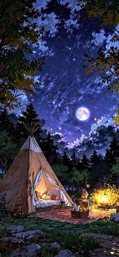 a teepee is lit up at night with the moon in the sky