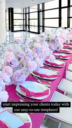 a long table set with pink and white plates, napkins and flowers on it