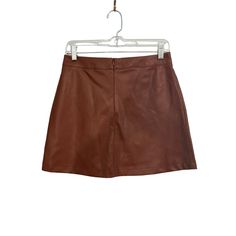 Bb Dakota Women’s Faux Leather Cognac Mini Skirt New With Tags Size Small. Approximate Measurements: Waist: 15 Inches Across Length: 15.8 Inches Brown Faux Leather Mini Skirt, Bb Dakota, Cognac, Mini Skirt, Womens Skirt, Mini Skirts, Faux Leather, Size Small, Skirt