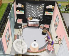 an aerial view of a doll's house with furniture and decor