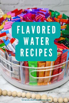 a plastic container filled with lots of different types of watercolors and the words, flavored water recipes