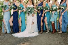 a group of women standing next to each other wearing cowboy boots and holding bouquets