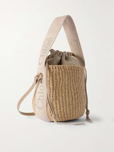 Shop CHLOÉ Woody small leather-trimmed raffia basket bag, Explore the latest CHLOÉ women's collection today on NET A PORTER Kenyan Women, Raffia Basket, Chloe Clothing, Trendy Purses, Wardrobe Classic, Basket Bag, Chloe Bag, Net A Porter, Crochet Bag