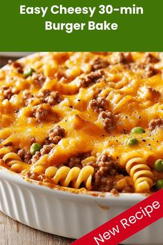 Alt text: Easy Cheesy 30-Min Burger Bake featuring rotini pasta, seasoned ground beef, and melted cheddar cheese in a white ceramic baking dish, topped with scattered green peas and black pepper. The pasta casserole has a golden, bubbly cheese topping and is photographed in close-up detail. Minced Beef Recipes, Hamburger Casseroles Recipes, Hamburger Casserole, Mince Recipes, Easy Cheesy, One Pan Meals, Mixed Vegetables, Casserole Recipes, Family Dinner