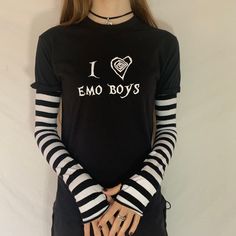 This item is hand printed on a 100% cotton t-shirt with an Acidcore label.  A Tim burton design style Black & white stripe sleeves sewn into the top with thumb holes & fingerless gives this top grunge goth vibes. The sleeves are available in the following colours: red & black, purple & black, white & black.  About Me:  Acidcore is my store based in London. All my items are hand printed with hand made transfers and some are hand embellished. My designs are inspired by different genres, gothic, fairycore, cottagecore, punk, indie. Spring Cotton T-shirt With Striped Sleeves, Emo Long Sleeve Tops With Letter Print, Trendy Striped T-shirt With Letter Print, White Long Sleeve Punk T-shirt, Emo Cotton Top For Spring, White Crew Neck T-shirt With Striped Sleeves, Spring Emo Style Cotton Top, White Long Sleeve T-shirt With Striped Sleeves, Emo Long Sleeve Graphic T-shirt