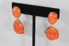 -Vintage 14k Gold Natural Japanese Momo Orange Red Coral Earring -Total length: 2 in -Round coral size: 16.5 mm x 12.4 mm -Tear drop coral size: 24.65 mm x 17.5 mm x 7.6 ( thickness ) -Total weight: 17.9 g -Tested 14k Elegant Coral Earrings For Formal Occasion, Luxury Coral Jewelry For Formal Occasions, Formal Coral Oval Jewelry, Formal Coral Jewelry With Cabochon Details, Formal Coral Jewelry With Cabochon, Orange Drop Earrings For Formal Occasions, Orange Pierced Earrings For Formal Occasions, Formal Orange Pierced Earrings, Formal Orange Gemstone Earrings