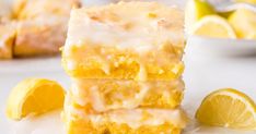 there are lemon bars stacked on top of each other