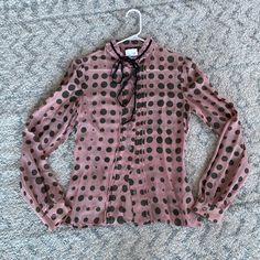 Brand New, Never Worn, Ended Up Being Too Small On Me. The Size Tag Says 26 / 40 And I Assumed This Was A Eur 40 But This Is Much Smaller. I'm Guessing This Is A Xxs. I Cannot Make Out The Fabric On The Tag, Looks To Be Faded But Feels Like Polyester. Dusty Rose With Black Polka Dots, Pleating Detail Down The Front, Lace Color, And The Ribbon Around The Neck Is Black Velvet. Armpit To Armpit 16.5" Shoulder To Bottom 24.5" Shoulder To Sleeve-End 25" 100% Authentic. Designer Pink Top For Formal Occasions, Designer Pink Formal Blouse, Feminine Polka Dot Party Blouse, Designer Pink Workwear Blouse, Designer Pink Blouse For Work, Designer Pink Blouse For Party, Polka Dot Blouse, Black Polka Dot, Dusty Rose