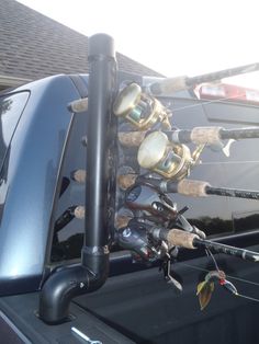 a truck with fishing rods on the back of it