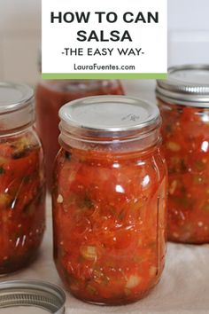 homemade canned salsa in mason jars on a table with the title overlay reading homemade canned salsa