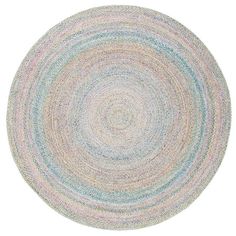 a round rug with multicolored lines on the center and bottom in blue, pink, green, yellow and white