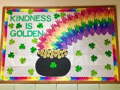 a st patrick's day bulletin board with shamrocks and a pot of gold