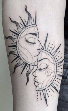 a woman's arm with a sun and moon tattoo on the left side of her body