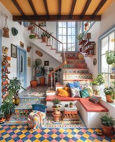 a living room filled with lots of furniture next to a stair case covered in potted plants