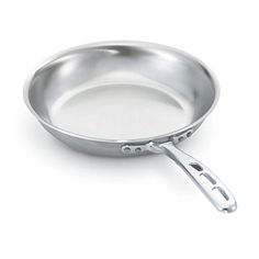 an empty frying pan on a white background