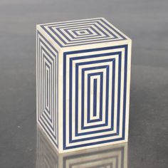 a white and blue object sitting on top of a table