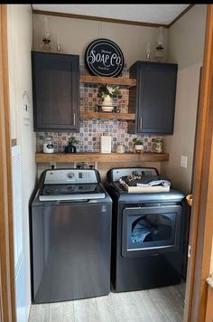 a washer and dryer in a small room