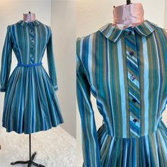 "1960's Blue And Green Stripe Shirt Dress This is such a great shirt dress. The stripes and the careful placement of them make this shirt dress next level attractive. Just check out the pictures and see how the stripes were perfectly utilized to make a regular cut shirt dress into something special. This dress is a button front closure, has her makers tag, which is frayed. Maker is Carol Rodgers Juniors Measurements provided are flat and have been doubled. Bust 34\" Waist 25\" Hips free\" Length Retro Blue Button-up Dress, Striped Fitted Cotton Shirt Dress, Fitted Striped Cotton Shirt Dress, Blue Vertical Stripes Dress For Daywear, Fitted Striped Shirt Dress With Buttons, Vintage Striped Workwear Dresses, Retro Striped Dresses With Buttons, Striped Retro Dresses With Buttons, Vintage Striped Dress For Work