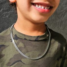 Get your little one on trend in the stunning shiny kids curb chain! The perfect everyday necklace for your little boy or girl! Your little once's confidence will be at an all time high with this beautiful, durable chain that will keep them shining. ✔Hypoallergenic ✔Quality Guaranteed  ✔Water Resistant WIDTH: 5mm MATERIAL: stainless steel COLOR: silver Silver Cuban Chain, Mens Silver Chain Necklace, Cuban Link Necklace, Cuban Chain Necklace, Hype Clothing, Silver Chain For Men, Fashion Eye Glasses, Everyday Necklace, Childrens Jewelry