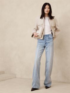 Our take on the uniform trend, we borrowed the utilitarian feel of the classic bomber jacket, paring down the details for a look that reads more 90s minimalism.  For fabric, we selected a luxurious and textured mix of cotton and linen, lightly lined so you can layer through the seasons.  Warmer: Lightly lined so you can layer it through the seasons.  Relaxed fit with wide sleeves.  Bomber collar with zip front closure.  Front and chest pockets.  Internal zip pocket.  Fully lined.  Relaxed fit. Celebrity Style Icons, Outfits Petite, Trendy Fall Outfits, White Jacket, Style Mistakes, Adidas Samba, Light Jacket, Fall Trends, Jacket Outfits