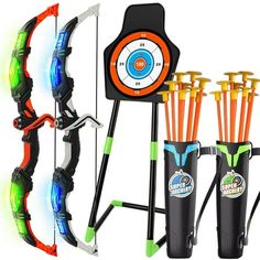 an assortment of archery bows and arrows