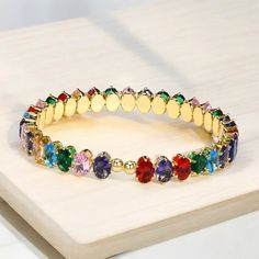 🎅 Don't miss our biggest sale ever - 50% off storewide, while stock lasts!🎅 Perfect piece as a Christmas present for a loved one. 18K Gold Plated Diamond Bracelet, Colourful Bracelet, Dainty, Gold Bracelet, Gifts for Her Beautiful 18k gold plated bracelet with zircon diamonds. This piece really grabs people's attentions and sparkles beautifully in the light.  Perfect for adding some elegance to any outfit.  Materials: 18K gold plated with Zircon diamonds Perimeter: 20cm  Packaging: Individuall Multicolor Gold Bracelet Gift, Multicolor Bangle Charm Bracelet For Party, Multicolor Gold Bangle Bracelet As A Gift, Multicolor Bangle Gold Bracelet As A Gift, Multicolor Gold Jubilee Bracelet, Colourful Bracelet, Dainty Gold Bracelet, Gold Armband, Bracelet Dainty